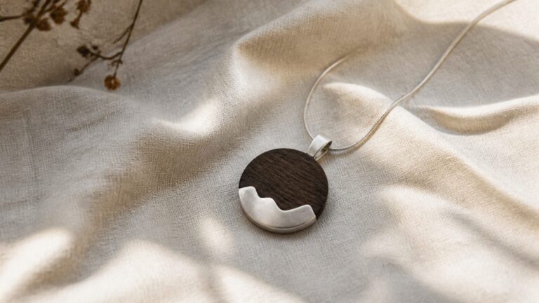 Contemporary matte silver and wood jewelry concept