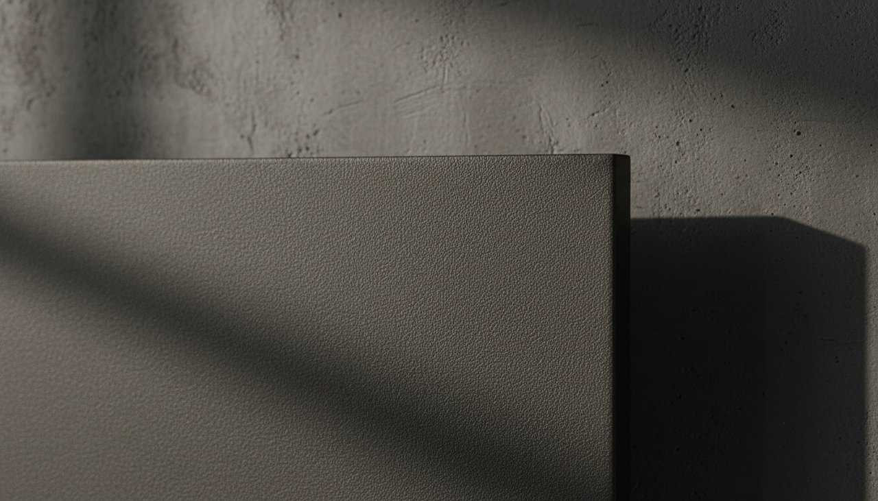 Tactile Essence – Matte Surface Detail Macro shot of matte black Fenix NTM surface texture with soft studio lighting